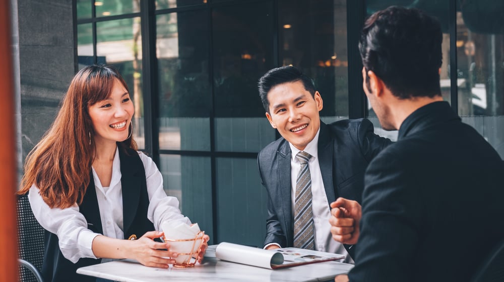 group-asian-business-people-business-district-talking-about-new-business-economic-outdoor-location